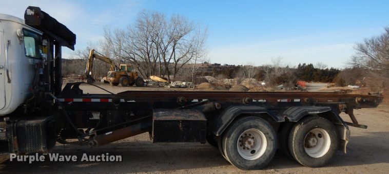 image for item DL2637 1995 Mack DM600  roll-off container truck