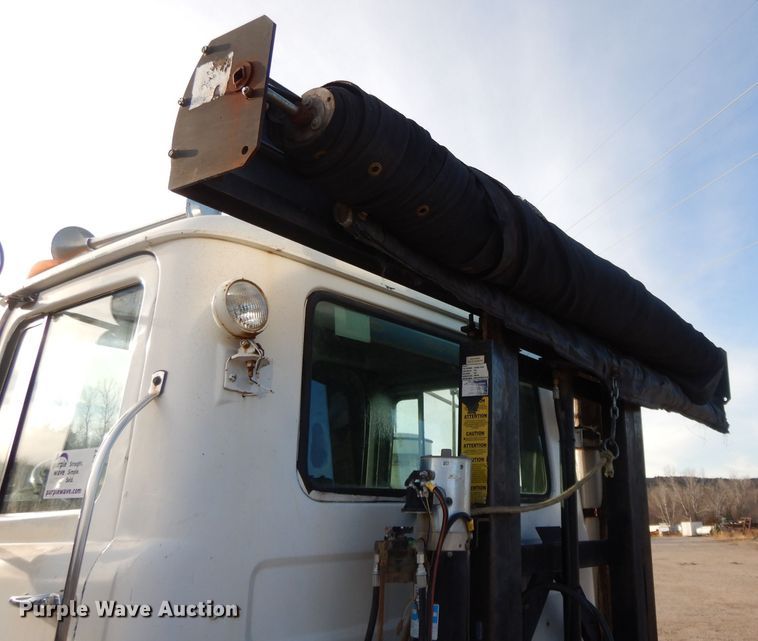 image for item DL2637 1995 Mack DM600  roll-off container truck