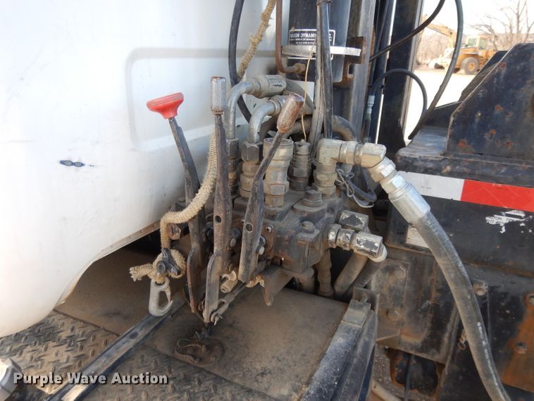 image for item DL2637 1995 Mack DM600  roll-off container truck