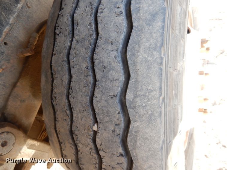 image for item DL2637 1995 Mack DM600  roll-off container truck