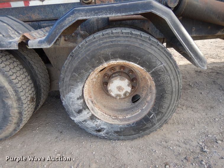 image for item DL2637 1995 Mack DM600  roll-off container truck