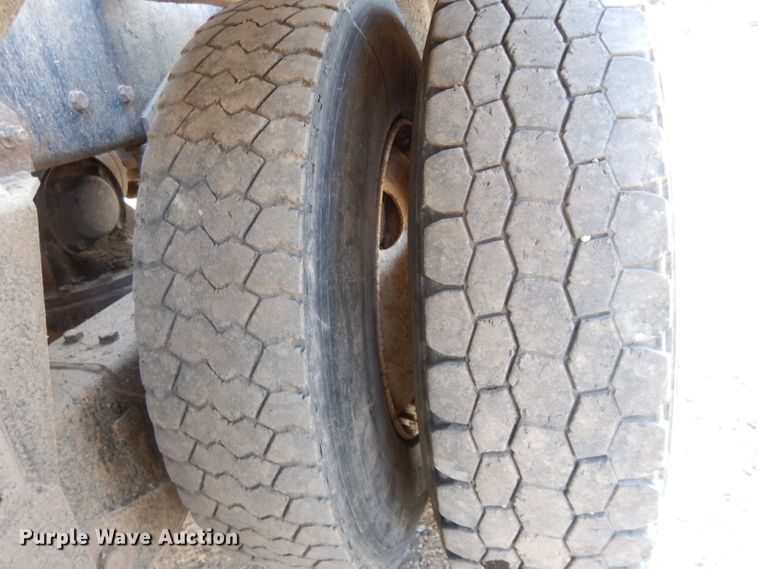 image for item DL2637 1995 Mack DM600  roll-off container truck