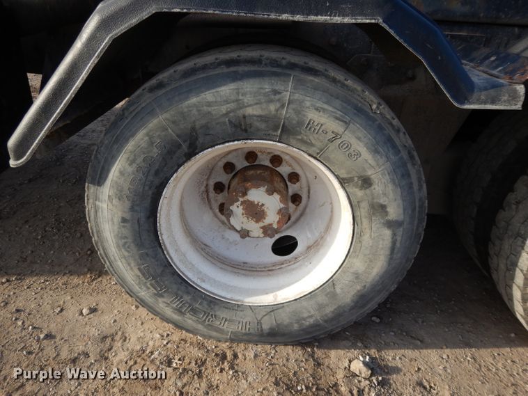 image for item DL2637 1995 Mack DM600  roll-off container truck