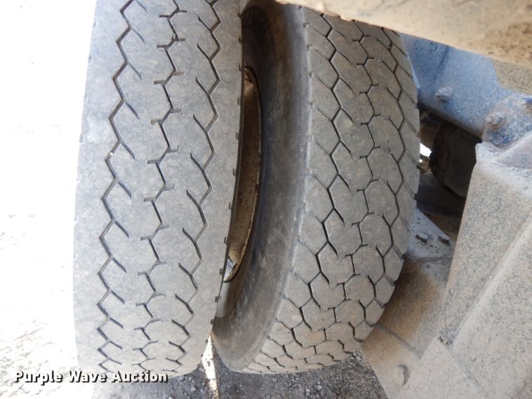 image for item DL2637 1995 Mack DM600  roll-off container truck