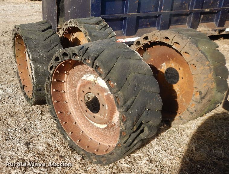 image for item DL2642 (4) solid skid steer tires