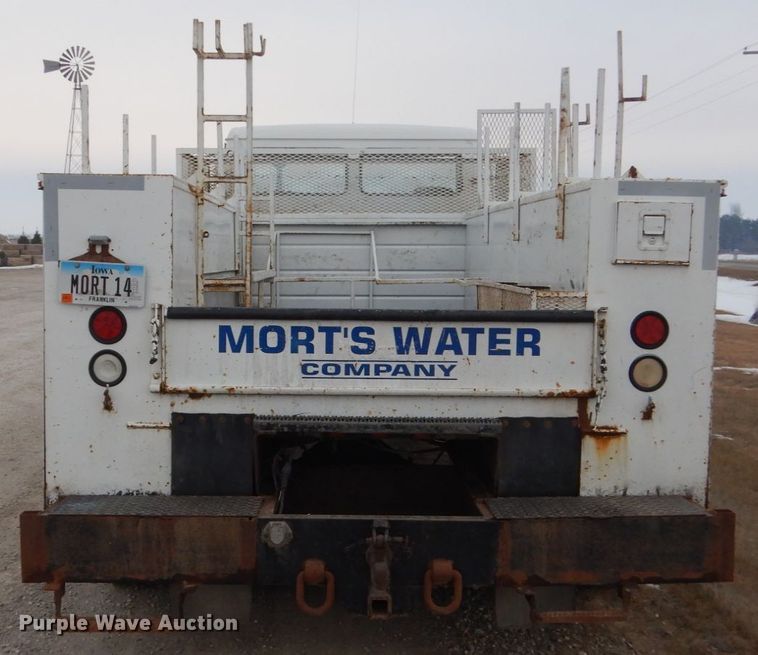 image for item HU9991 1999 Freightliner FL60  utility / service truck