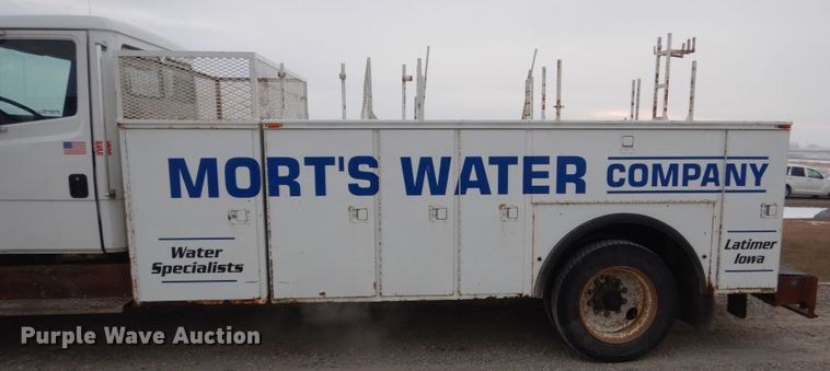 image for item HU9991 1999 Freightliner FL60  utility / service truck