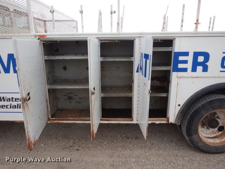 image for item HU9991 1999 Freightliner FL60  utility / service truck