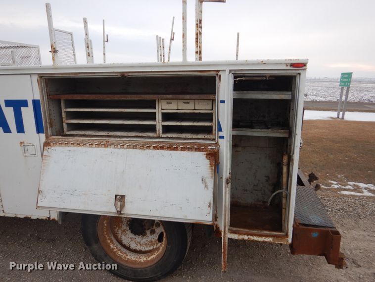 image for item HU9991 1999 Freightliner FL60  utility / service truck