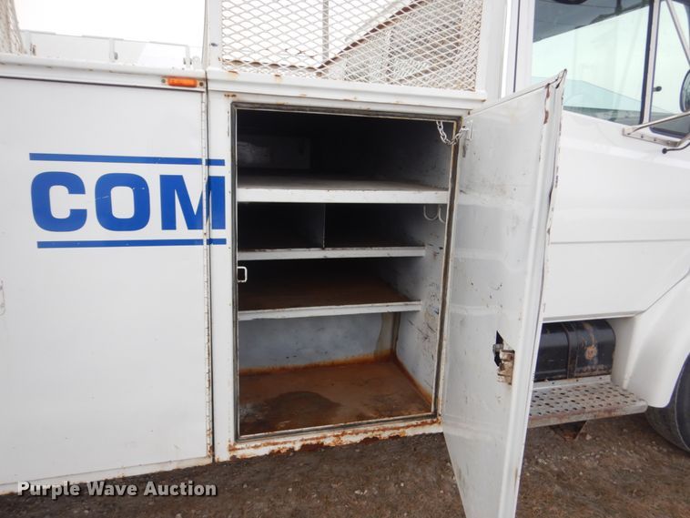 image for item HU9991 1999 Freightliner FL60  utility / service truck