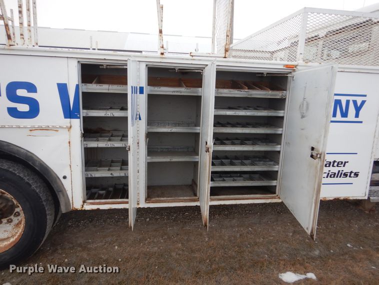 image for item HU9991 1999 Freightliner FL60  utility / service truck