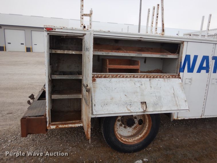 image for item HU9991 1999 Freightliner FL60  utility / service truck