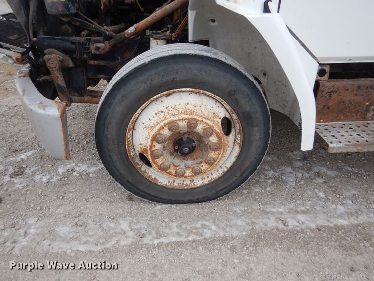 image for item HU9991 1999 Freightliner FL60  utility / service truck