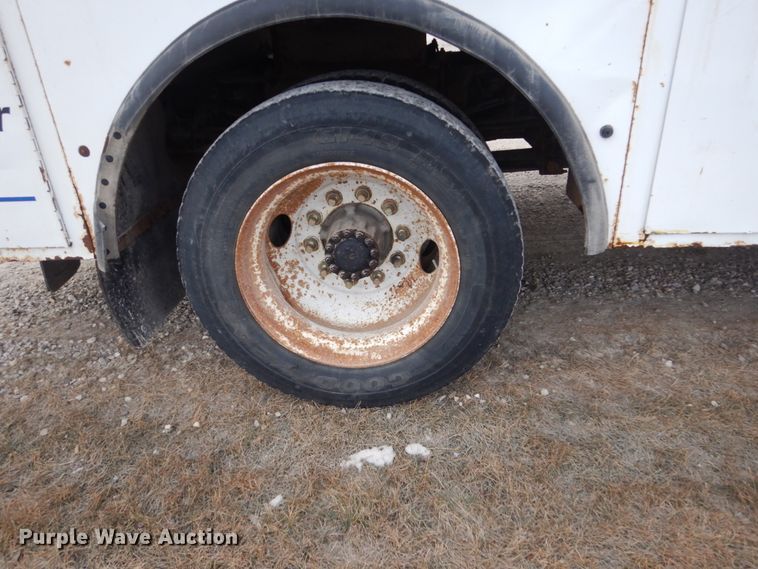 image for item HU9991 1999 Freightliner FL60  utility / service truck