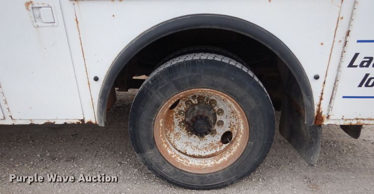 image for item HU9991 1999 Freightliner FL60  utility / service truck