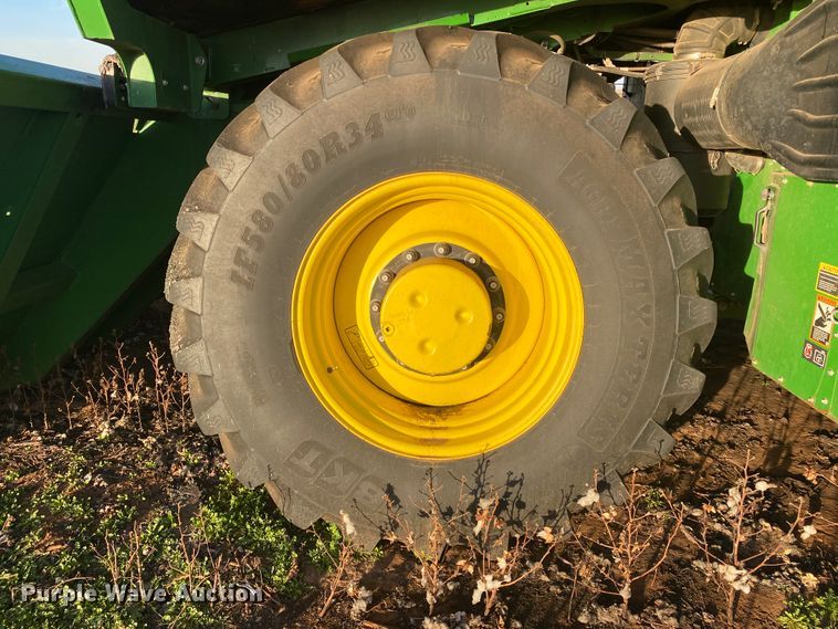 image for item HI9014 2019 John Deere CP690 cotton picker