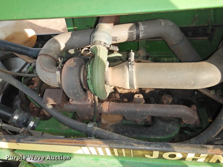 image for item HN9073 1990 John Deere 8760  4WD tractor