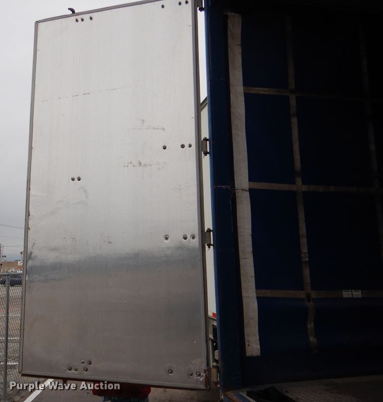 image for item DJ0503 2004 Utility TS2CHA side curtain trailer