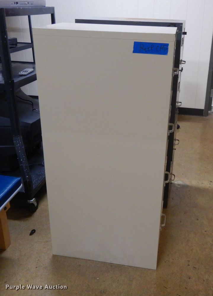 image for item DL2671 (2) four drawer filing cabinets