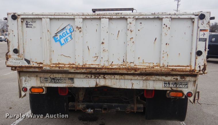 image for item HW9847 2006 Ford F450  flatbed truck