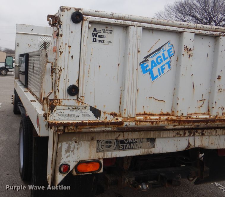 image for item HW9847 2006 Ford F450  flatbed truck