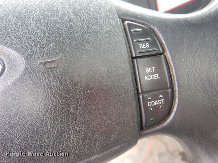 image for item HW9847 2006 Ford F450  flatbed truck