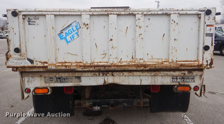 image for item HW9847 2006 Ford F450  flatbed truck