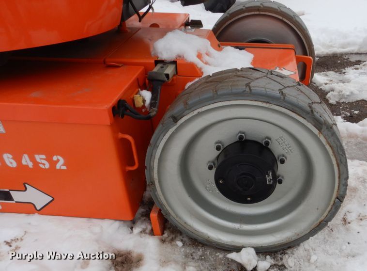 image for item HS9912 JLG E300AJP  boom lift