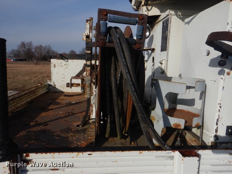 image for item HX9125 2003 International 4300 SBA  digger derrick truck