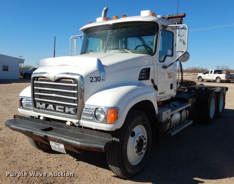 image for item DG1520 2007 Mack CV713  semi truck with vacuum pump