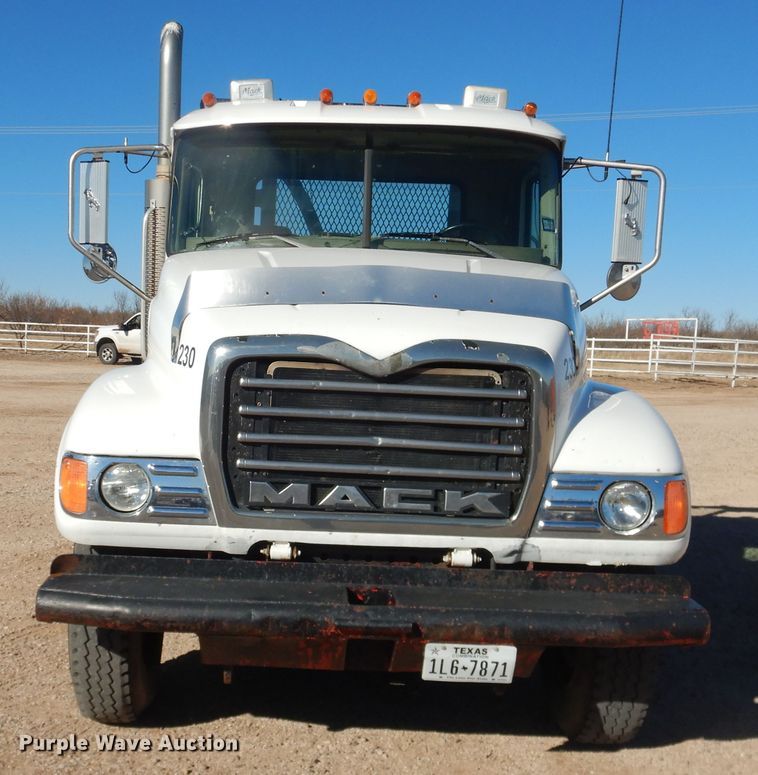 image for item DG1520 2007 Mack CV713  semi truck with vacuum pump