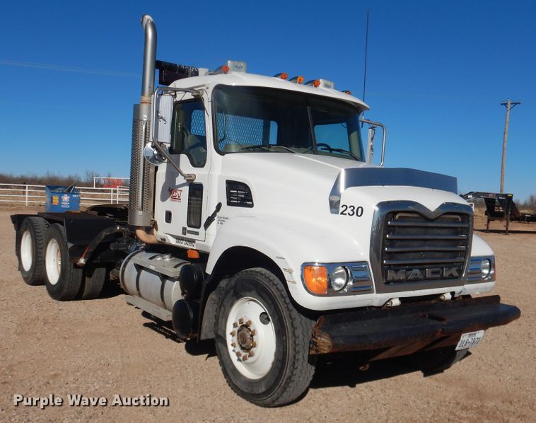 image for item DG1520 2007 Mack CV713  semi truck with vacuum pump