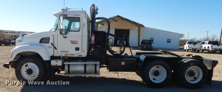 image for item DG1520 2007 Mack CV713  semi truck with vacuum pump