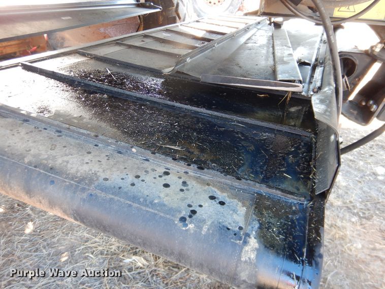 image for item DJ4931 2018 MacDon M1240  windrower