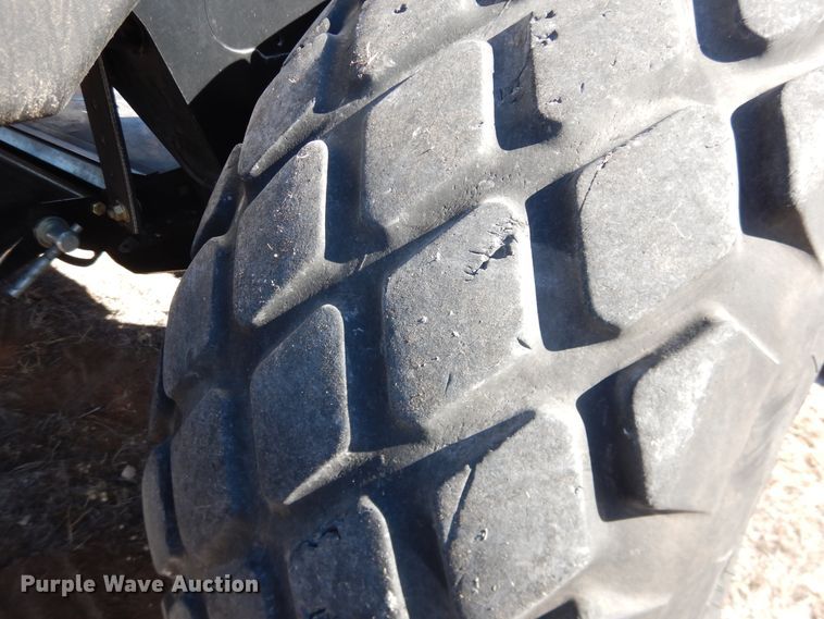 image for item DJ4932 2017 MacDon M1240  windrower