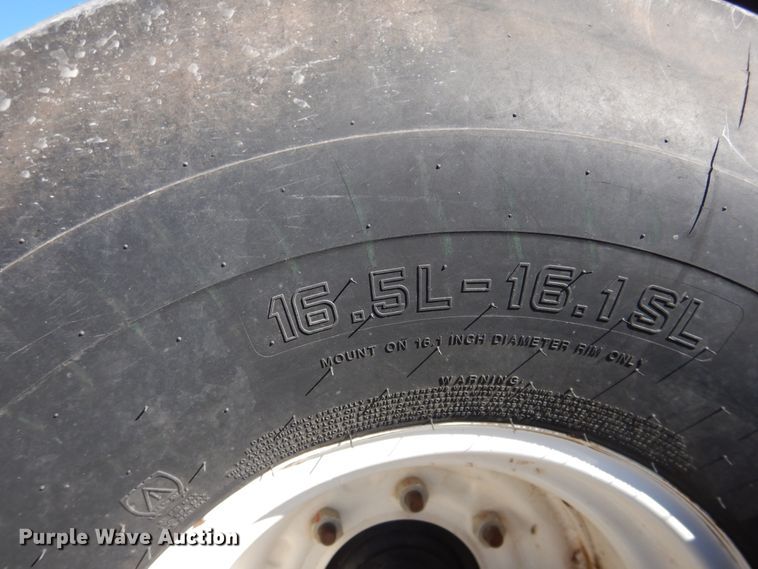 image for item DJ4932 2017 MacDon M1240  windrower