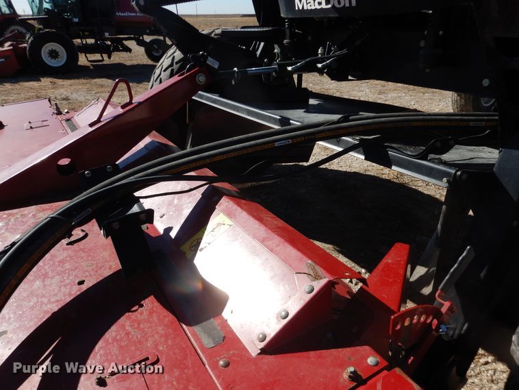 image for item DJ4933 2017 MacDon M1240  windrower