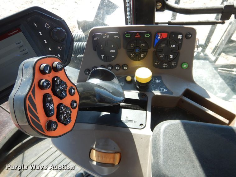 image for item DJ4933 2017 MacDon M1240  windrower