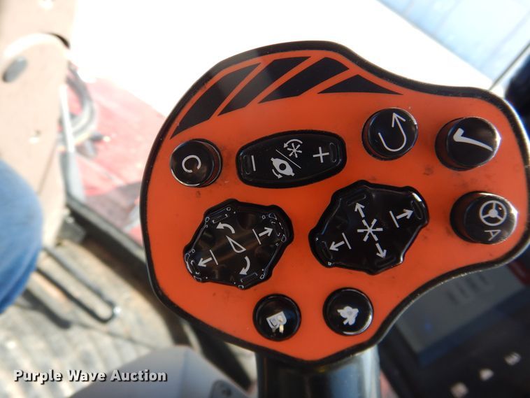 image for item DJ4933 2017 MacDon M1240  windrower