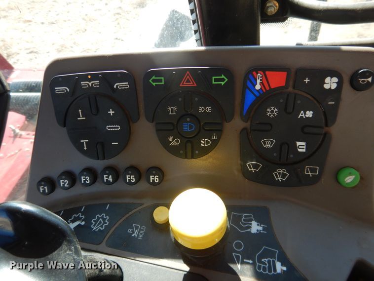 image for item DJ4933 2017 MacDon M1240  windrower