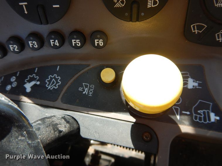 image for item DJ4933 2017 MacDon M1240  windrower