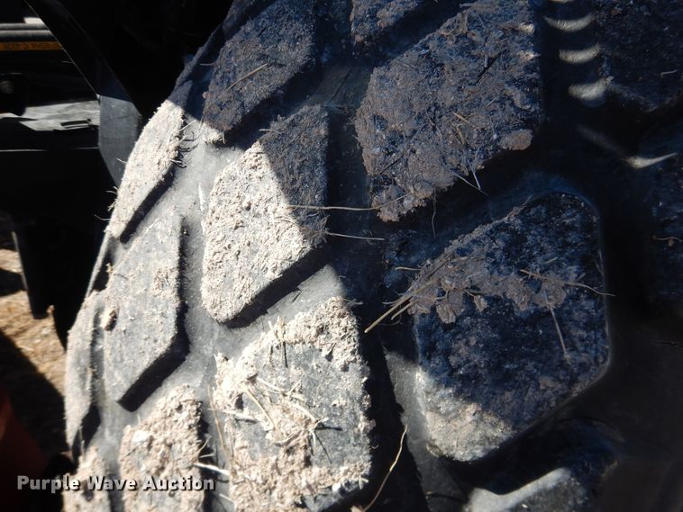 image for item DJ4933 2017 MacDon M1240  windrower