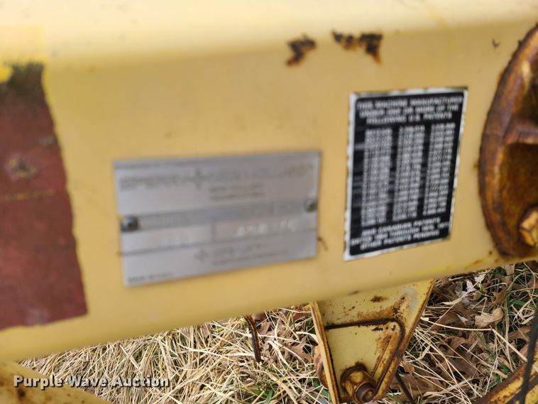 image for item IA9253 New Holland Rolabar 256 hay rake