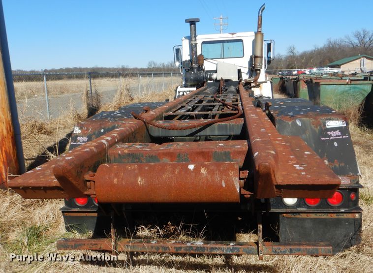 image for item DJ8621 1996 Mack MR  roll-off container truck