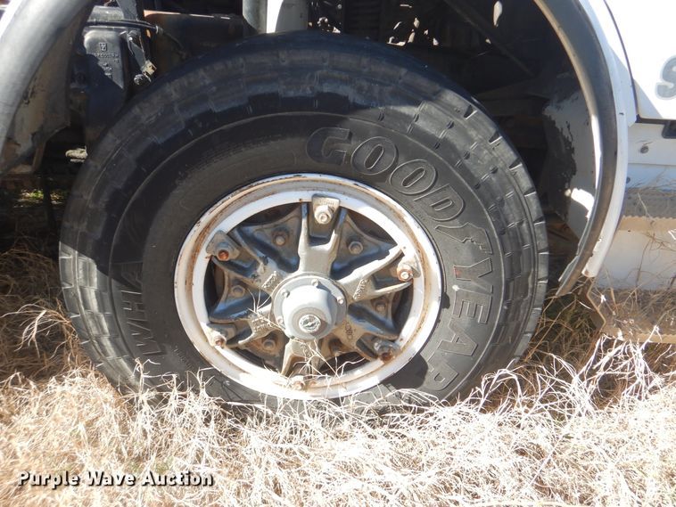 image for item DJ8621 1996 Mack MR  roll-off container truck