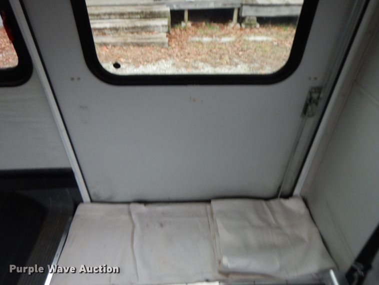 image for item GG9332 2009 Ford E350  shuttle bus