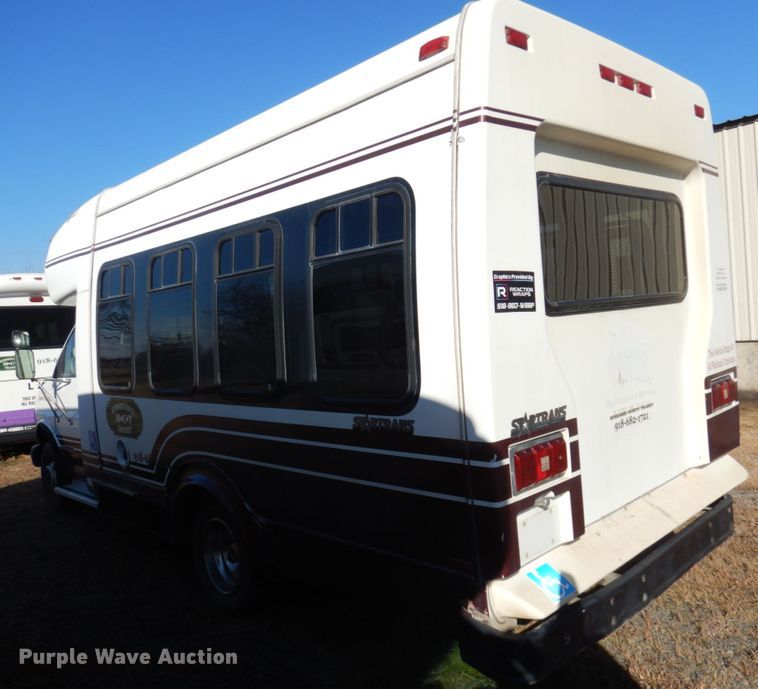 image for item HW9857 2000 Chevrolet Express  shuttle bus