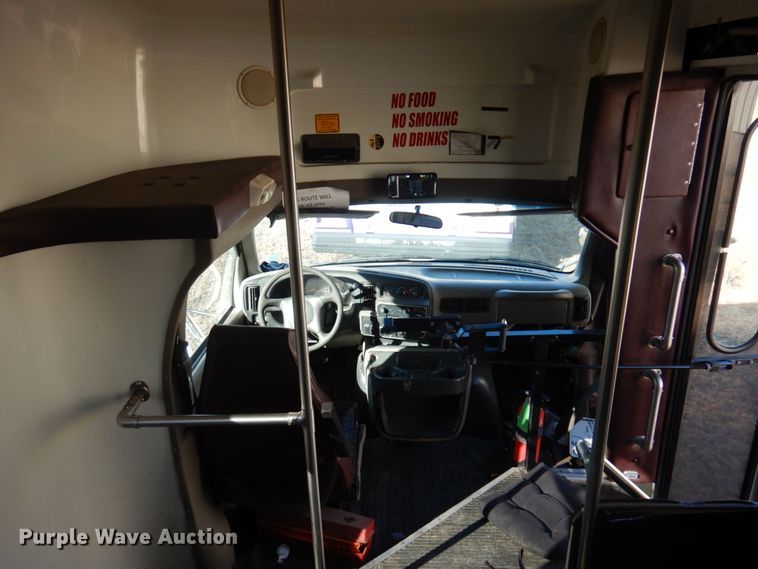 image for item HW9857 2000 Chevrolet Express  shuttle bus