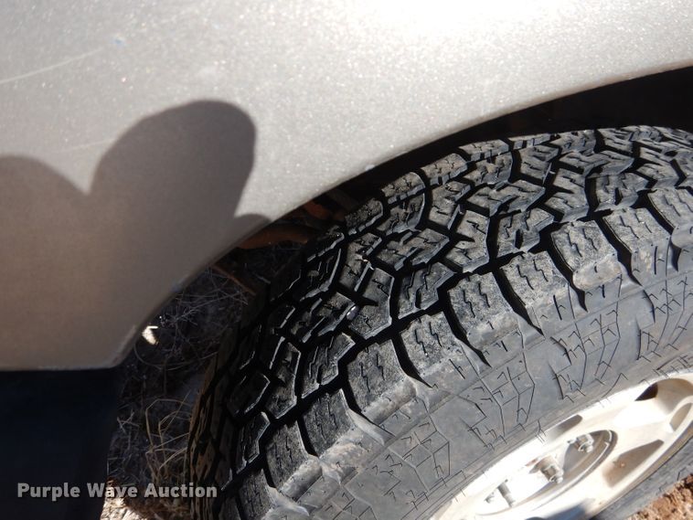 image for item DJ4918 2003 Chevrolet Silverado 1500  Ext. Cab flatbed pickup truck