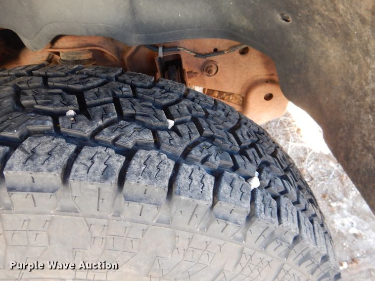 image for item DJ4918 2003 Chevrolet Silverado 1500  Ext. Cab flatbed pickup truck